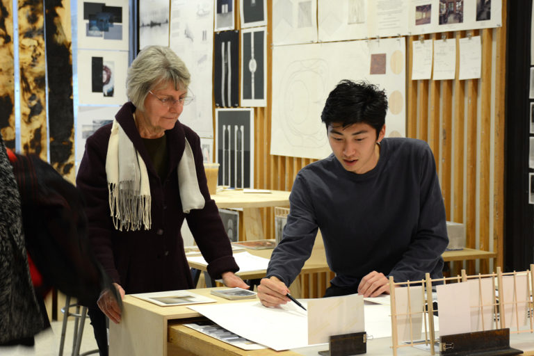 Professor Dunay meets with architecture thesis student.